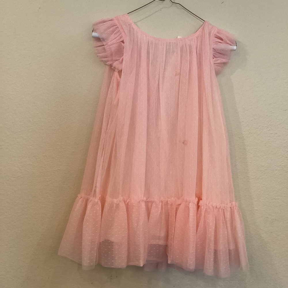 Size 7/8, Richie house brand, pink.